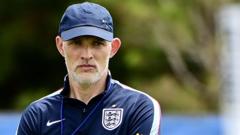 cover-7649-1780704070jpg - 實發體育 Man wearing England football team polo and cap, outdoors, neutral expression on a field.