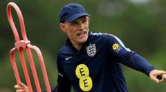 cover-7816-1781316057jpg - 實發體育 England footballer in training gear moves around a pink training dummy on a practice field during drills