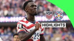 cover-7822-1781363158jpg - 實發體育 Soccer player in a red-and-white striped jersey celebrating, with USA and opposing team badges and a 'HIGHLIGHTS' label on a bright overlay. Highlight thumbnail for a USA match.
