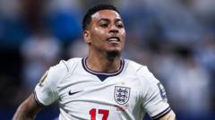 cover-8820-1784419260jpg - 實發體育 England national team footballer in a white kit with the number 17, running on the pitch during a match.