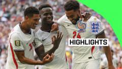 cover-8828-1784426430jpg - 實發體育 Three England footballers celebrate a goal on the field, with a 'HIGHLIGHTS' label and a bright green corner overlay to the right.