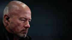 cover-9076-1785463225jpg - 實發體育 Close-up of a bald man with a serious, somber expression against a dark background.