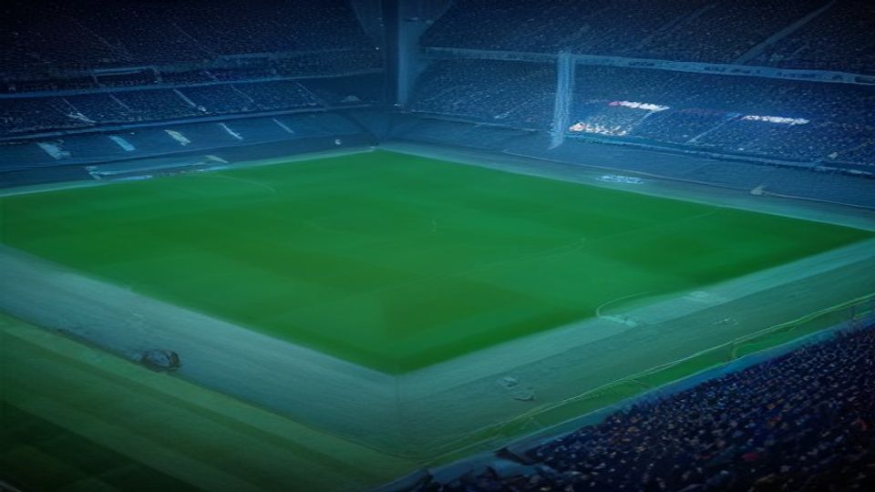 cover-9189-1786406454jpg - 實發體育 Empty football stadium at night with a bright green pitch and surrounding seating.