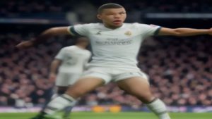cover-9201-1786492853jpg - 實發體育 Blurred soccer player in a white kit with arms spread wide on the pitch during a match, stadium crowd in the background.