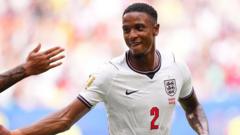 cover-9227-1786665657jpg - 實發體育 England national football team player in a white kit with number 2 celebrating on the field