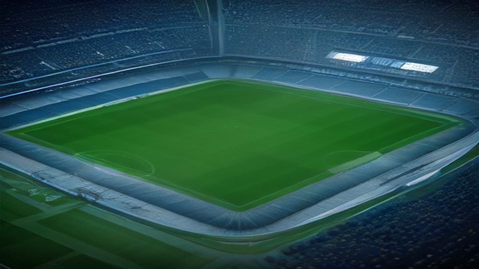 Aerial view of a large empty football stadium with a lush green pitch and surrounding stands.