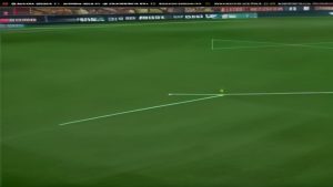 cover-9256-1786924866jpg - 實發體育 Soccer field with a white boundary line; a small yellow ball sits on the line near the edge of the pitch.