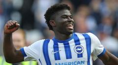cover-9313-1787356862jpg - 實發體育 Footballer in Brighton & Hove Albion kit celebrating with a raised fist on the pitch.