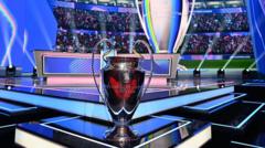 Shiny trophy on a glass pedestal on a futuristic game show set with blue lighting and an audience in the background.